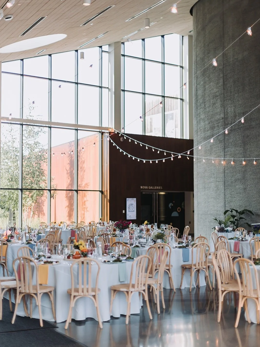 Proof that chair rentals and floor length linens can TRANSFORM a space. We helped design this couples day and it was very focused on DIY projects because the bride is an epic crafter. The chairs were the most expensive part of their design, because t