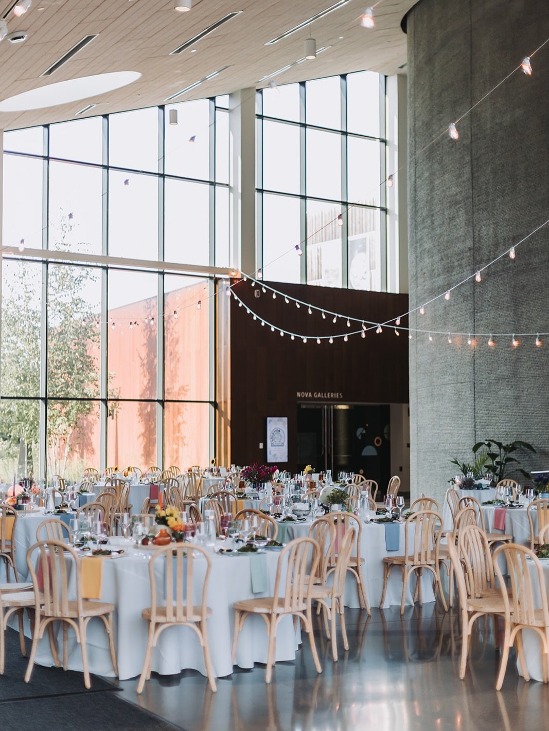 Proof that chair rentals and floor length linens can TRANSFORM a space. We helped design this couples day and it was very focused on DIY projects because the bride is an epic crafter. The chairs were the most expensive part of their design, because t