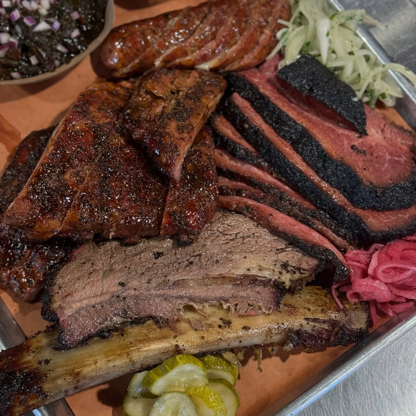 Talk about the best way to start the weekend&hellip;a platter full of Pastrami Brisket, a beef rib, pork ribs, and our Habanero Fontina sausage. 💨 

Our doors are open and pastrami brisket is on the board today. Come out for lunch! 🤠
