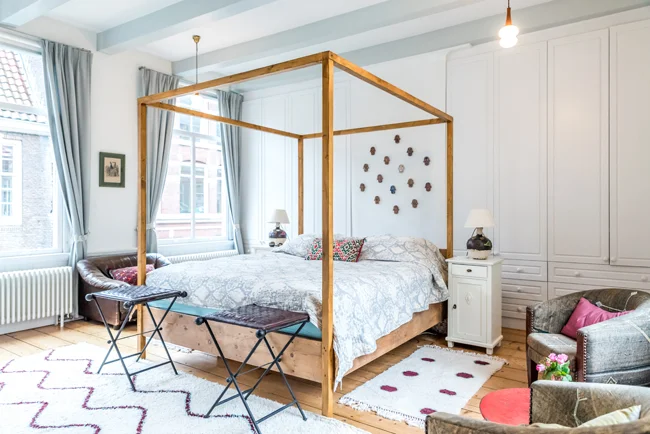 our house_master bedroom_bed made from old wooden floor boards from our house.jpg