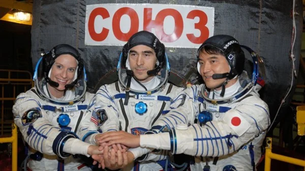 Kate Rubins, Anatoly Ivanishin, and Takuya Onishi before departing on Soyuz spacecraft. Photo courtesy of NASA