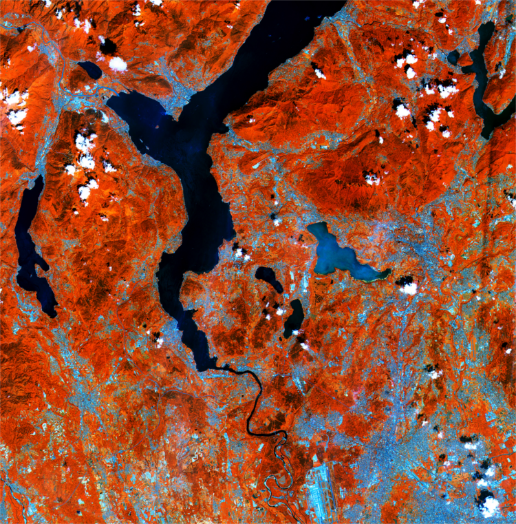Lakes on the southern side of the Italian Alps are pictured in this early acquisition by the Sentinel-2A satellite (Copernicus/ESA). Processed using the high-resolution infrared channel of the satellite’s multispectral camera, the image shows healthy vegetation in red, such as the hills and mountains in the upper part of the image. Lakes on the southern side of the Italian Alps are pictured in this early acquisition by the Sentinel-2A satellite (Copernicus/ESA). Processed using the high-resolution infrared channel of the satellite’s multispectral camera, the image shows healthy vegetation in red, such as the hills and mountains in the upper part of the image.