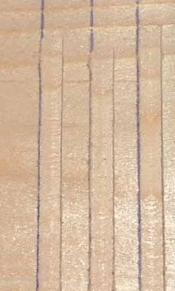 The left and center cuts split the mark and the cut on the right is at the edge of the mark.