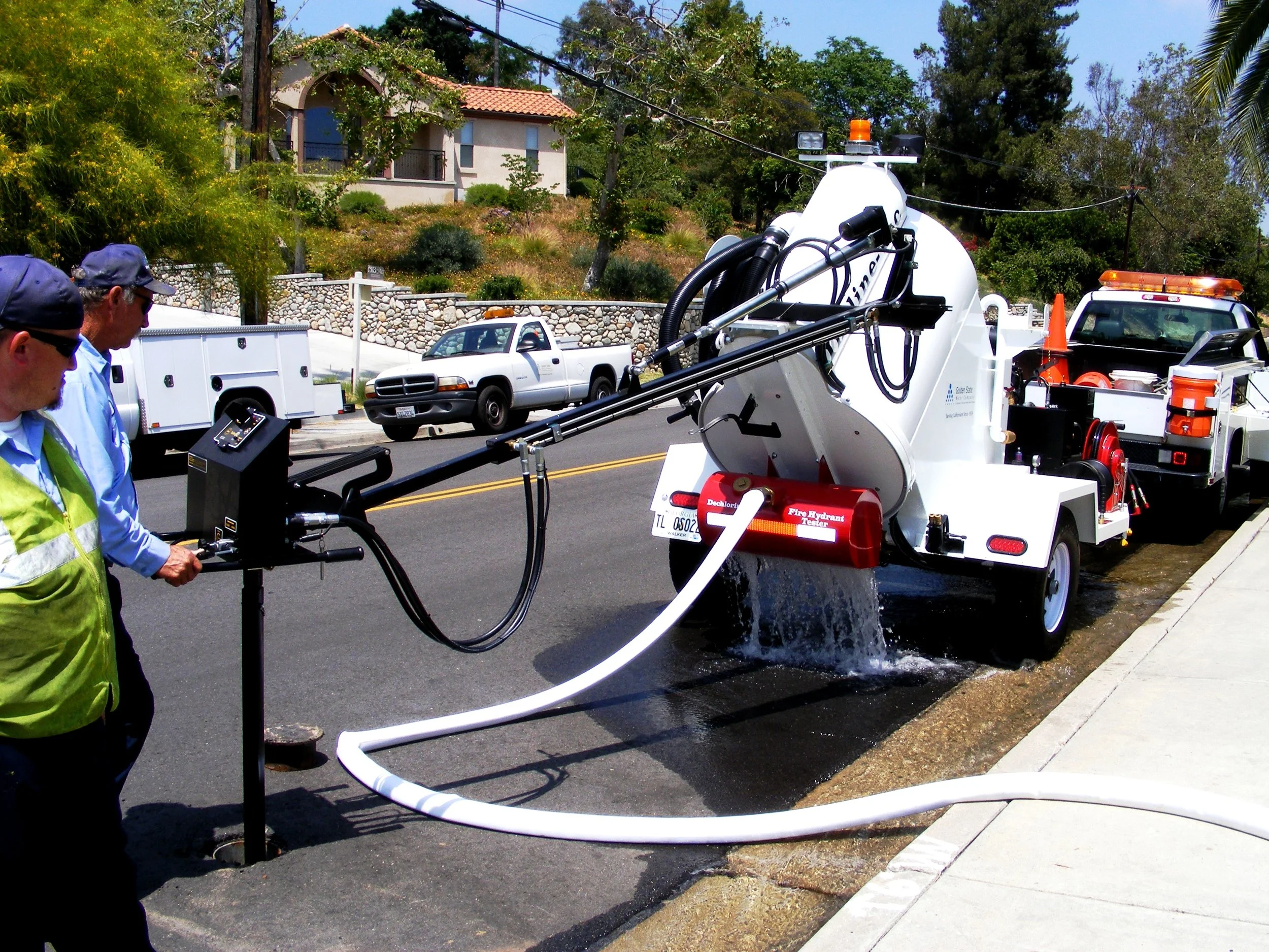 Valve Exerciser flushing a fire hydrant