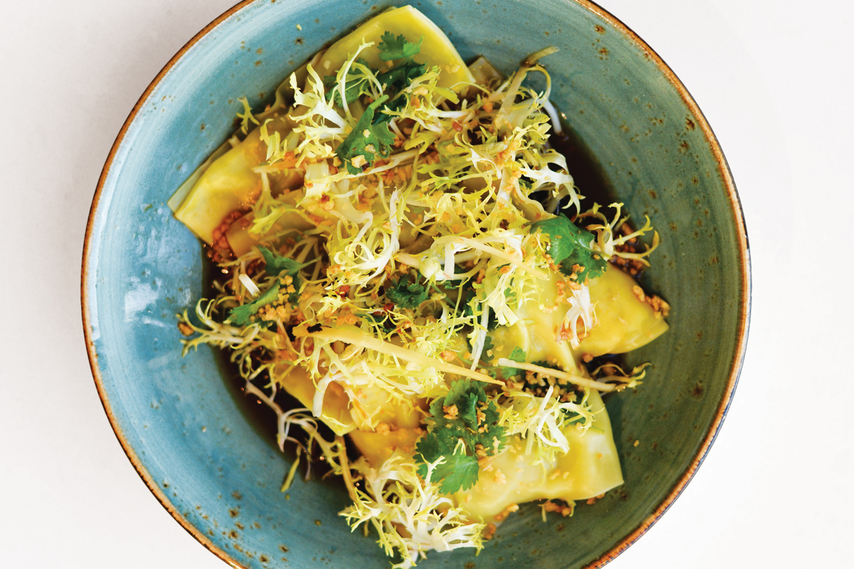 The pork, crab and shrimp dumplings come with a chili soy dipping sauce. Photo: Heather Ellison