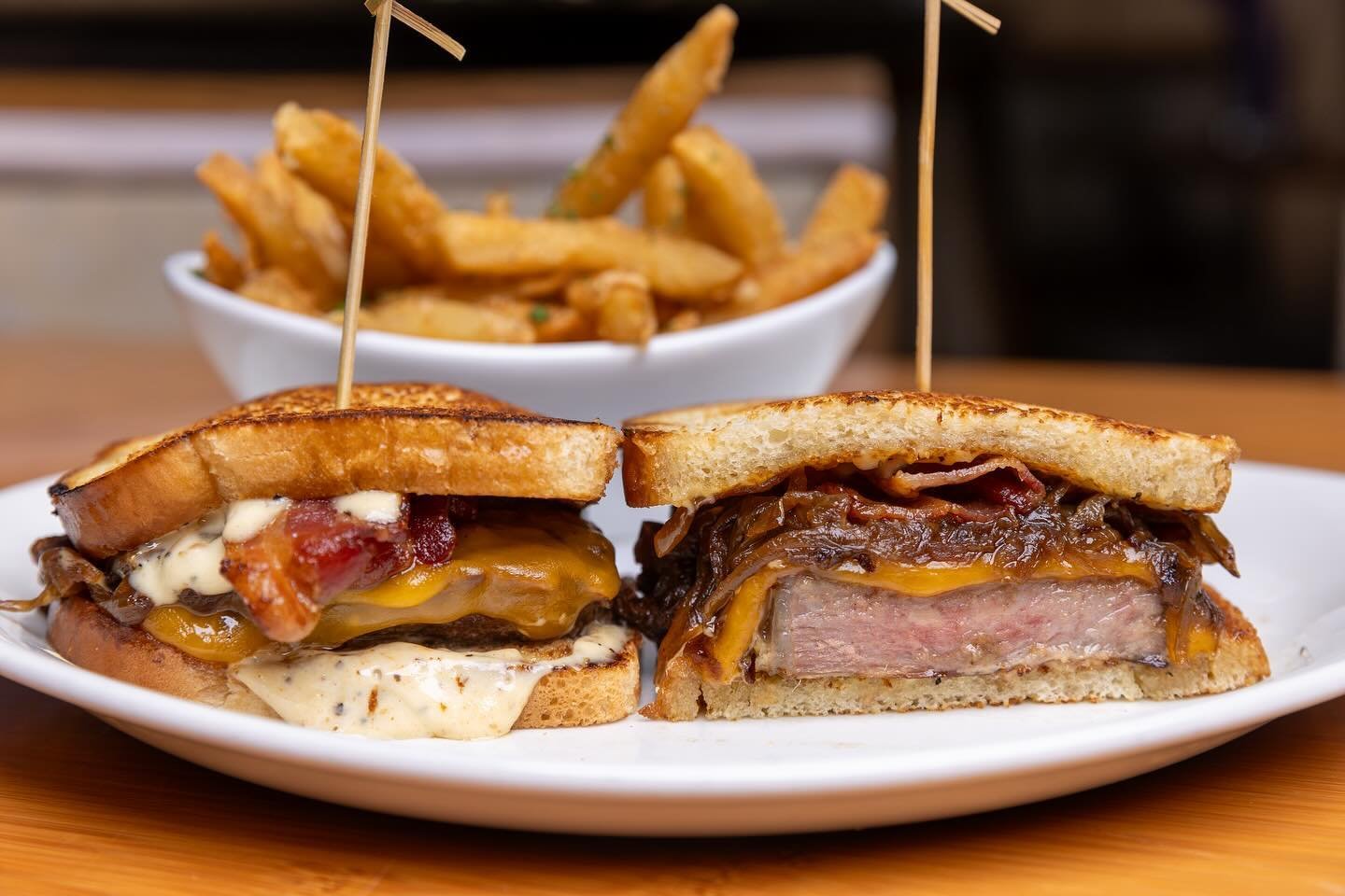Refuel with a golfer&rsquo;s favorite: our Griddled Certified Angus Beef Prime Rib Sandwich. Featuring smoky bacon, caramelized onions, Vermont cheddar cheese, and mustard peppered mayo on griddled sourdough, served with garlic fries. Perfect for a m