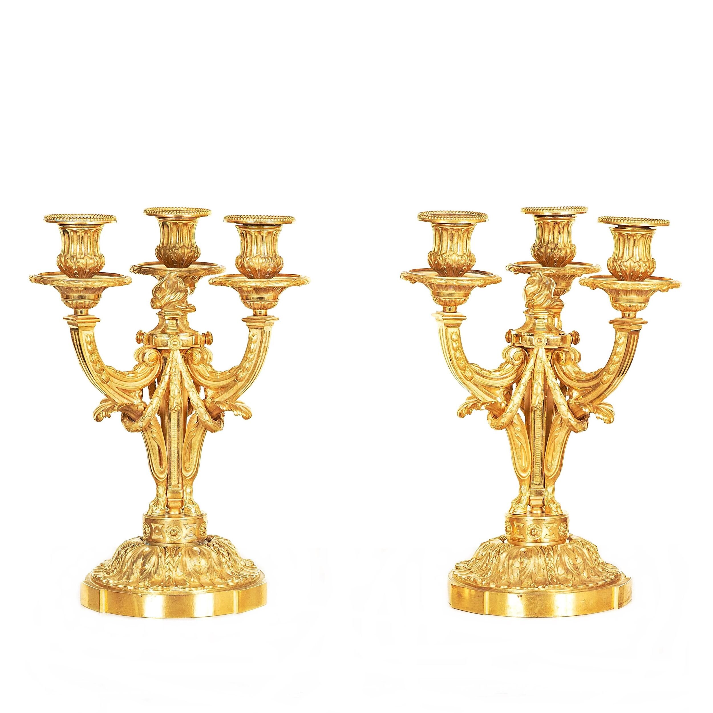 Brännförgyllda kandelabrar