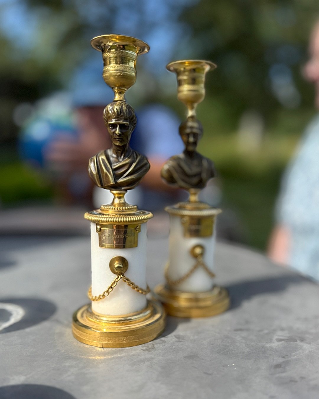 Two gilt and patinated bronze candlesticks depicting the philosophers Rousseau and Voltaire, attired as Roman consuls, mounted on bases of Carrara marble. France Ca 1810. #portraitsofphilosophers #ormolucandlesticks #empirecandelsticks #f&ouml;rgylda