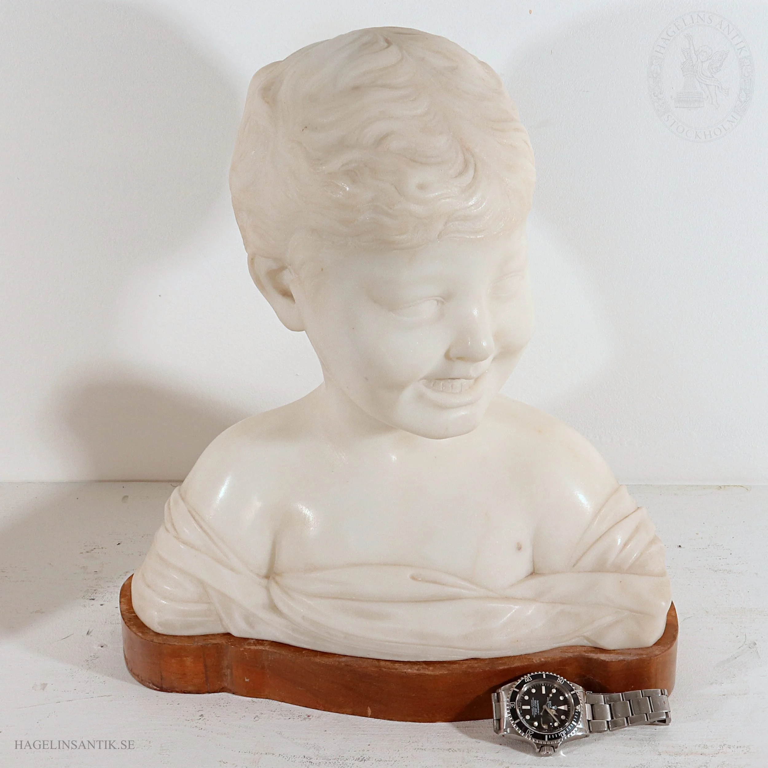 ”Skrattande pojke”, marmor, ca 1900, efter Desiderio da Settignano