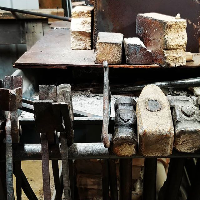 Full rack of hammers and tongs next to the forge.  Spots are filling for the tool making classes.  Claim your spot!  www.mikedippelblacksmith.com