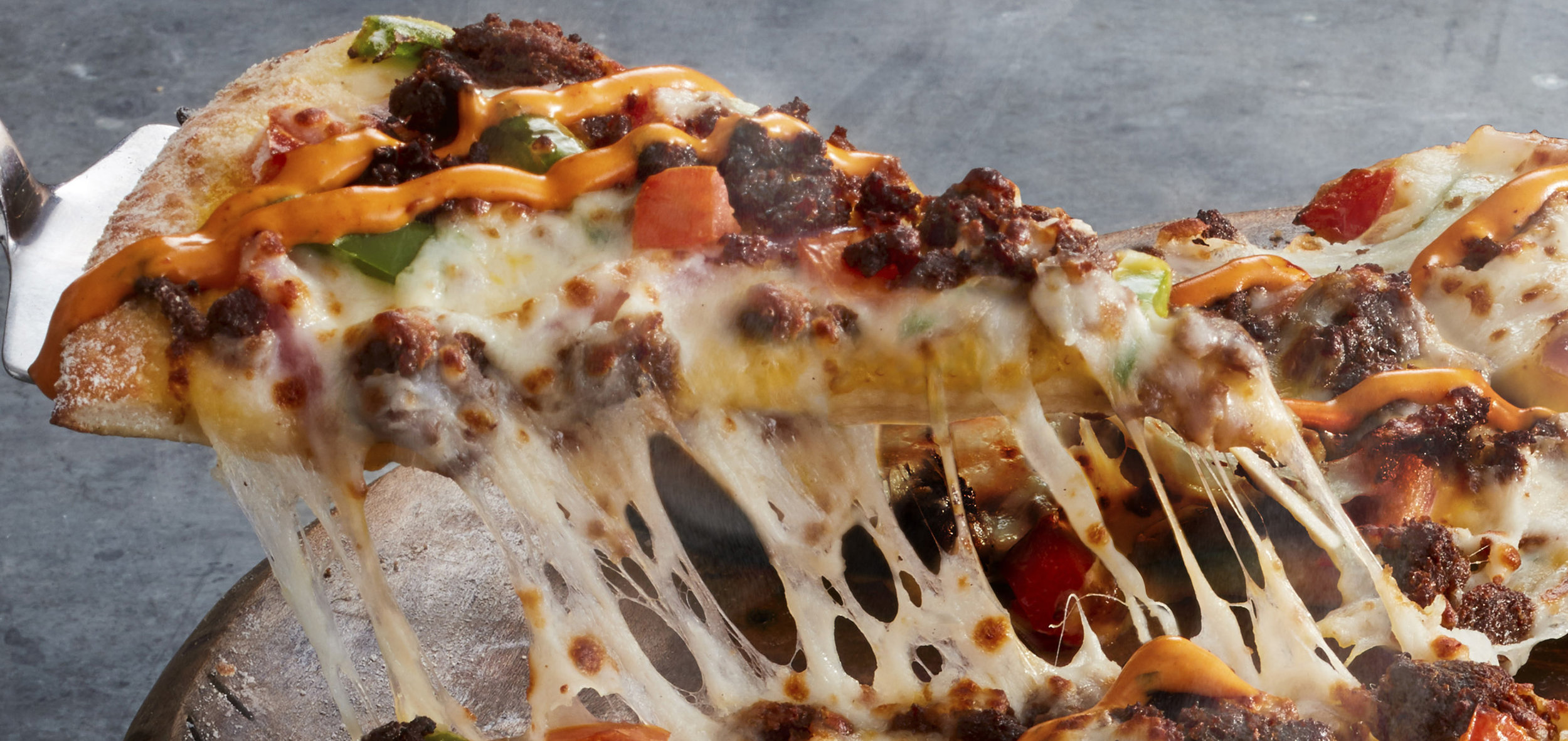 DOMINO'S DELIVERS PLANT-BASED PIZZAS