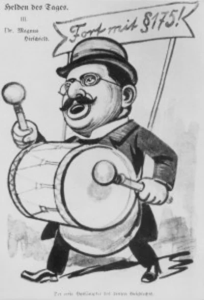 A 1907 political cartoon depicting Hirschfeld as ‘Hero of the Day,’ drumming up support for the abolition of Paragraph 175 of the German penal code that criminalized homosexuality. The banner reads, ‘Away with Paragraph 175!’ The caption reads, ‘The foremost champion of the third sex!’ – US Holocaust Memorial Museum Photo Archives