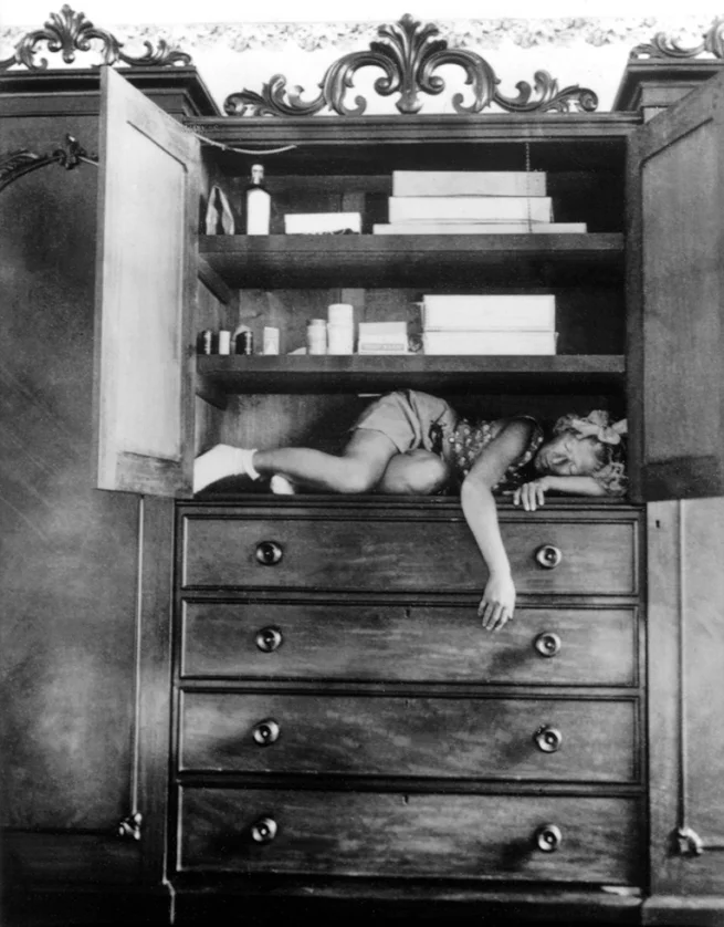self portrait in cupboard 1932 jersey heritage.jpg