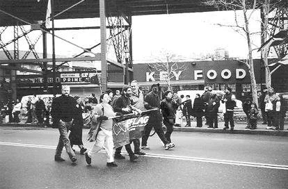 Undated photo of Brenda (left, white pants) with her partner Larry Nelson marching with the PFLAG Queens at the St. Patrick's Day for All parade. 