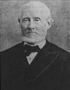 Lizzie’s Father, Andrew Borden, looking like a penny-pinching asshole.