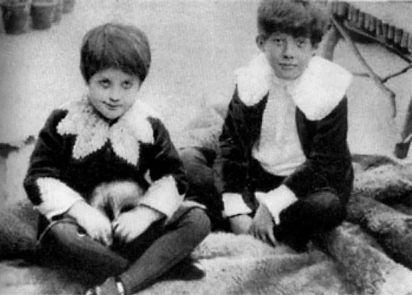 Vyvyan (left) and Cyril (right) Holland.