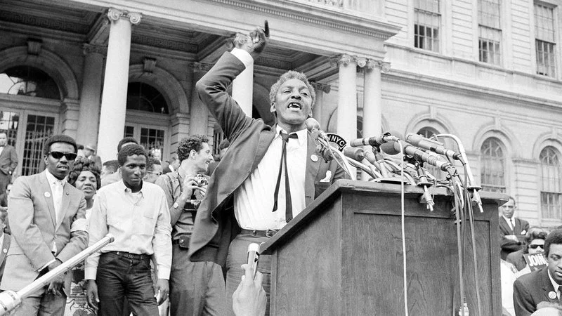 Rustin speaking at the ralley for school integration at City hall in New York, 1964.