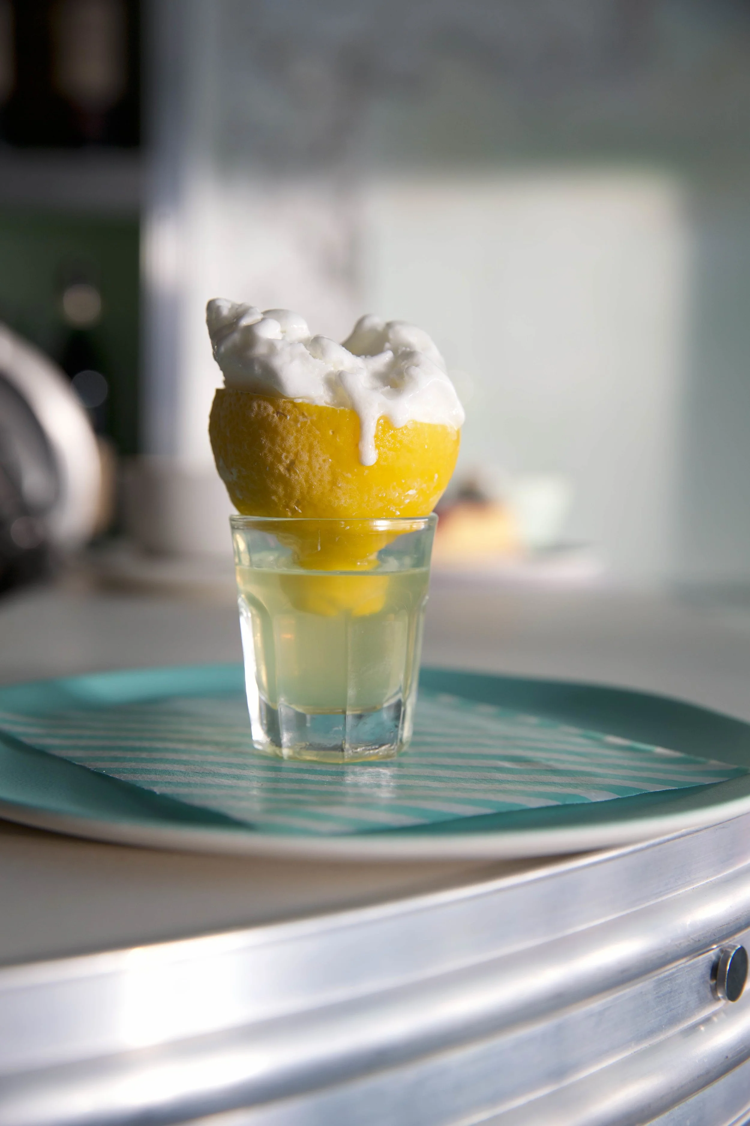I love this dish, lemon sorbet served on a glass of lemoncello; such a wonderful simple execution