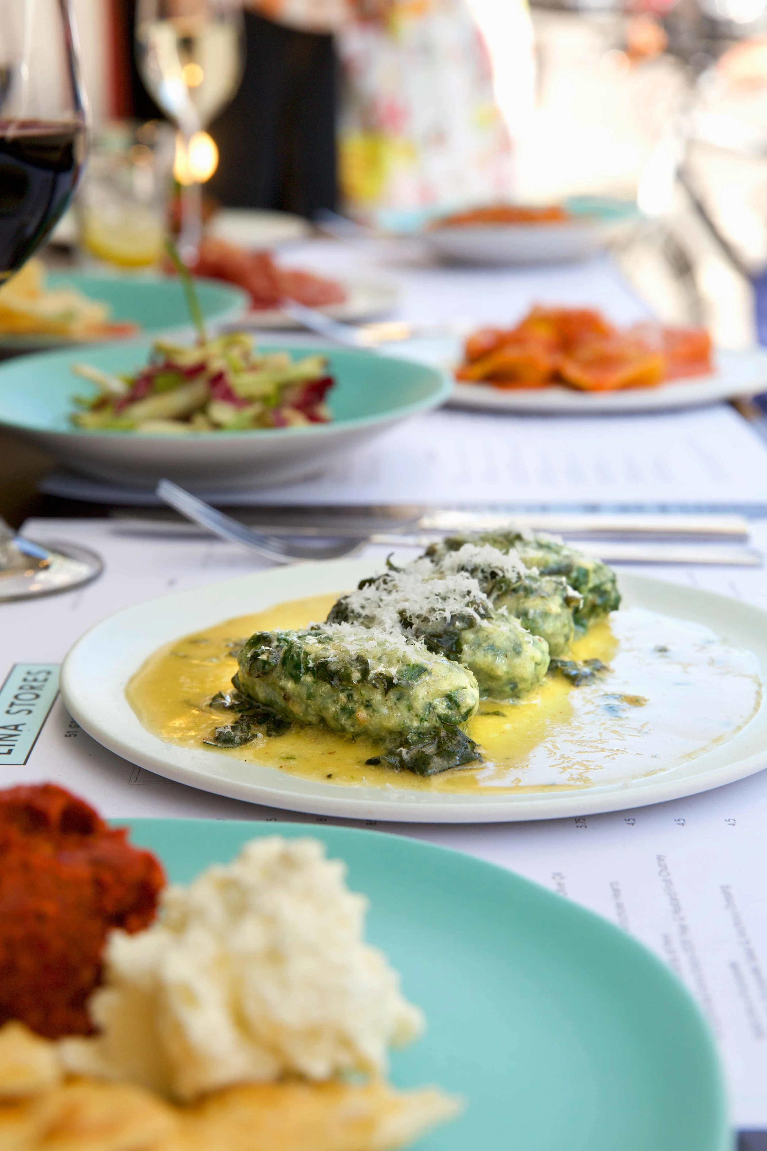 LinaRestaurant_2597OutdoorFoodSelectionBrighterGnudiNW.jpg