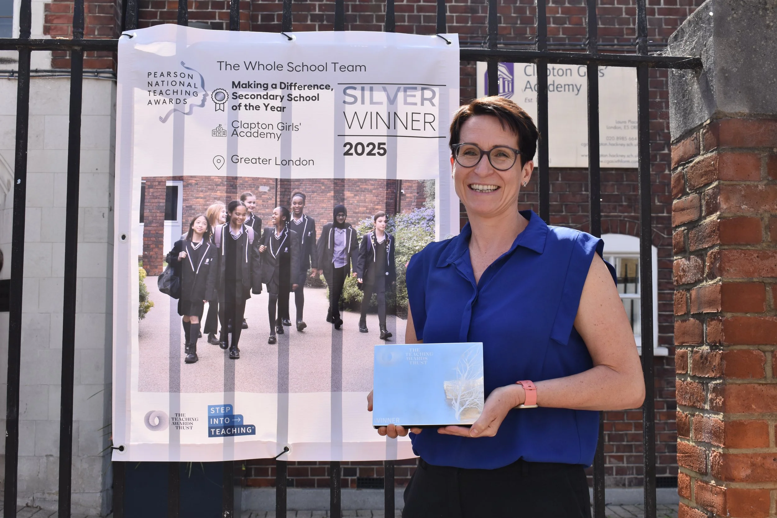 Anna Feltham, Headteacher with award.JPG