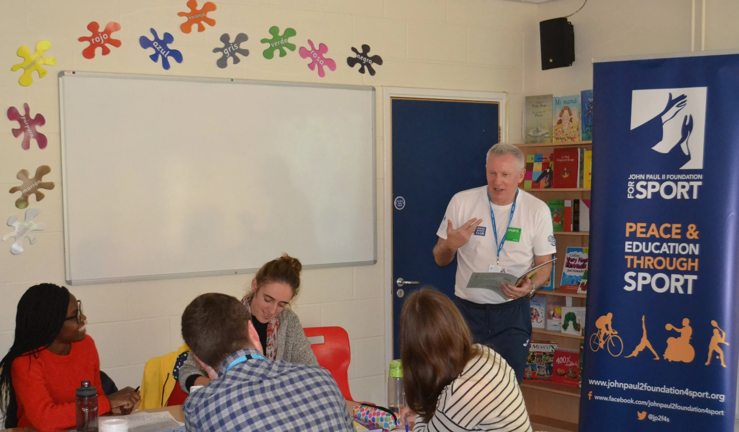 Dr Colm Hickey explaining the Aim High For All programme to St Mary University students