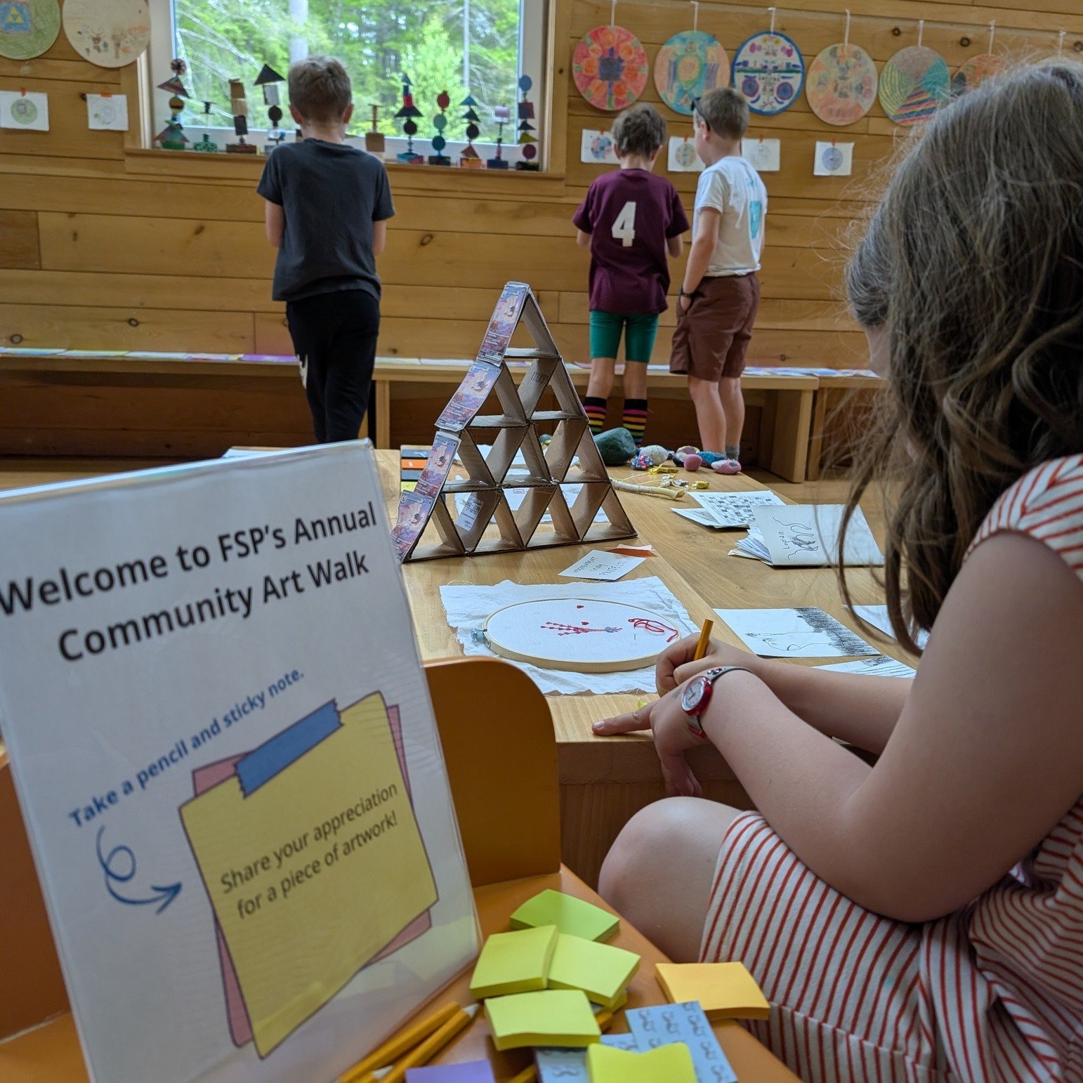 FSP's Annual Community Art Walk was held on Friday! 
Art teacher Yasamin set up the downstairs with works from the school year, and families added to the display with art of their own.  Everyone was invited to share words and simple drawings to expre