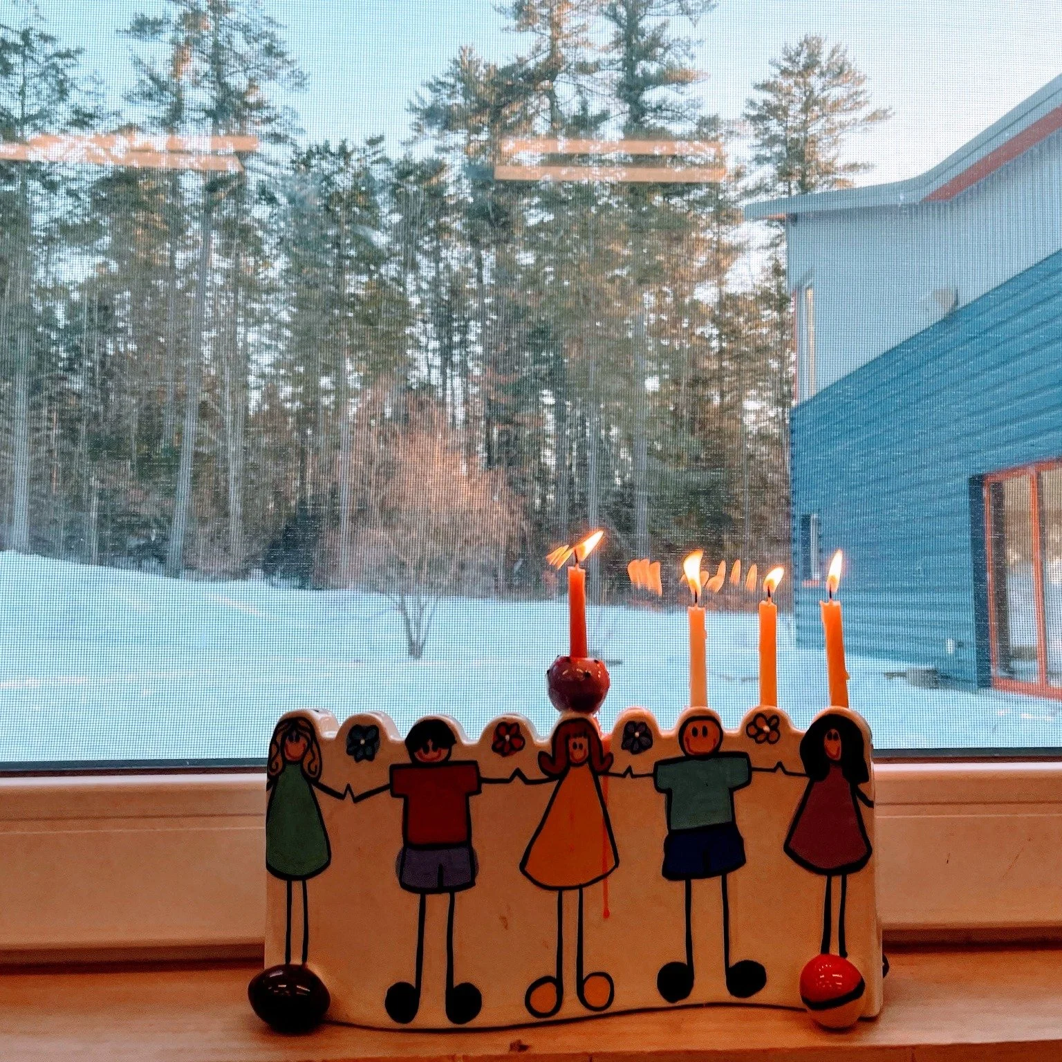 During the last week of school before Winter Break, we celebrated this season of light.
 
... kindergarteners lighting the menorah to share in the celebration of Hanukkah with their teacher.
... walking the Solstice Spiral with families.
... learning