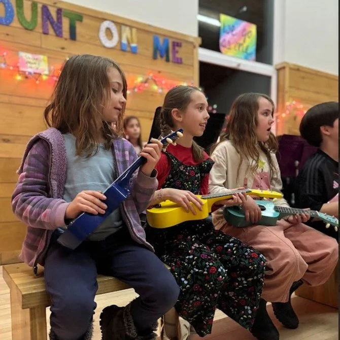 "You are the song that the morning brings" 
"Dona Nobis Pacem"
"I'm unstoppable!" 

Surrounded by inspirational and favorite musical lyrics, third through eighth-grade students took to the stage!  Our evening songshare w