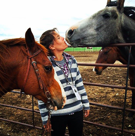 kristin with horses kissing.png