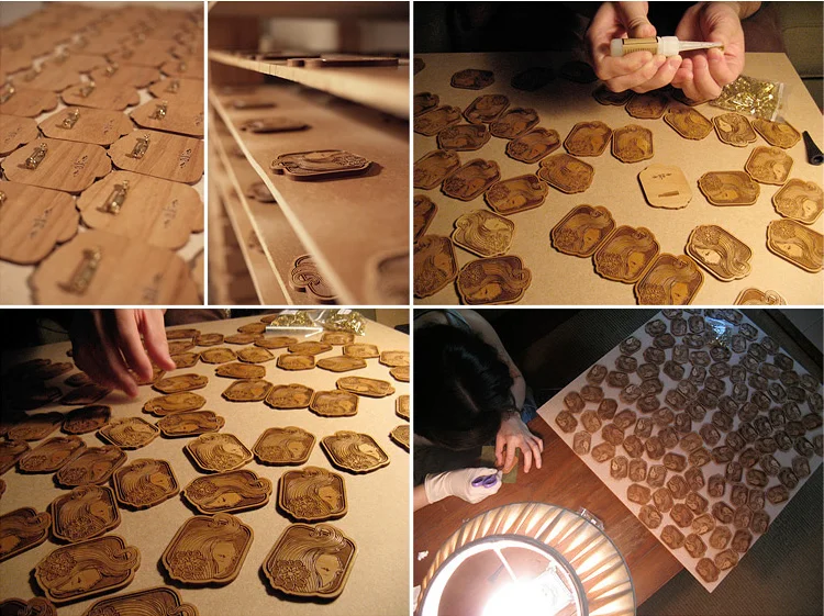 engraved wooden brooches. 2010. limited edition of 1200.