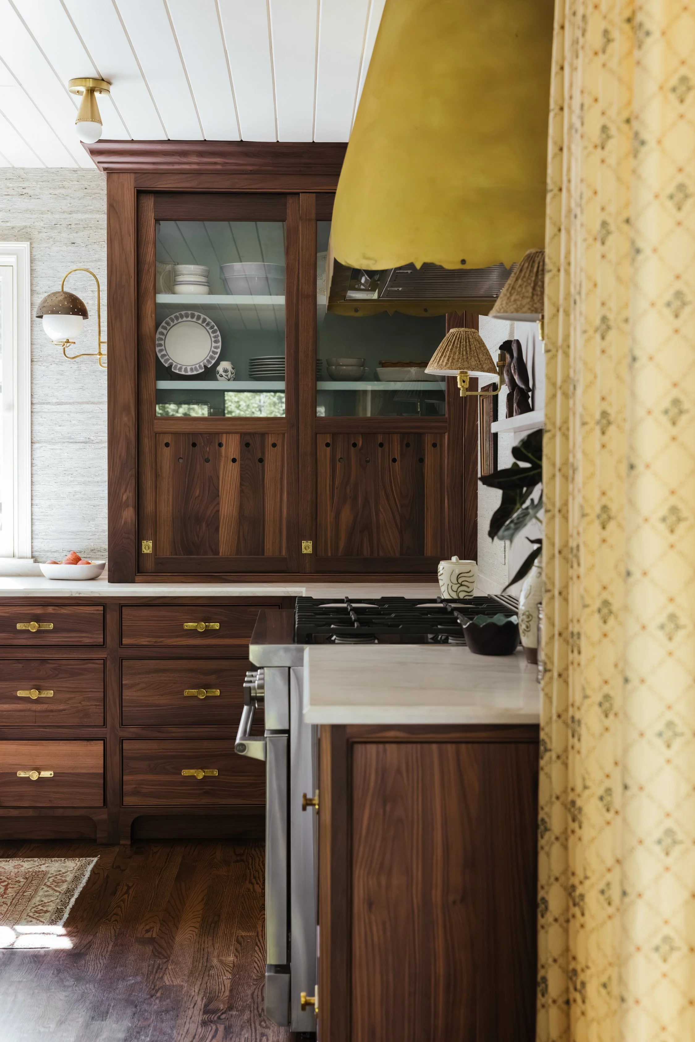 Black Walnut Kitchen Cabinets with Custom Brass Range Hood in Athens Georgia
