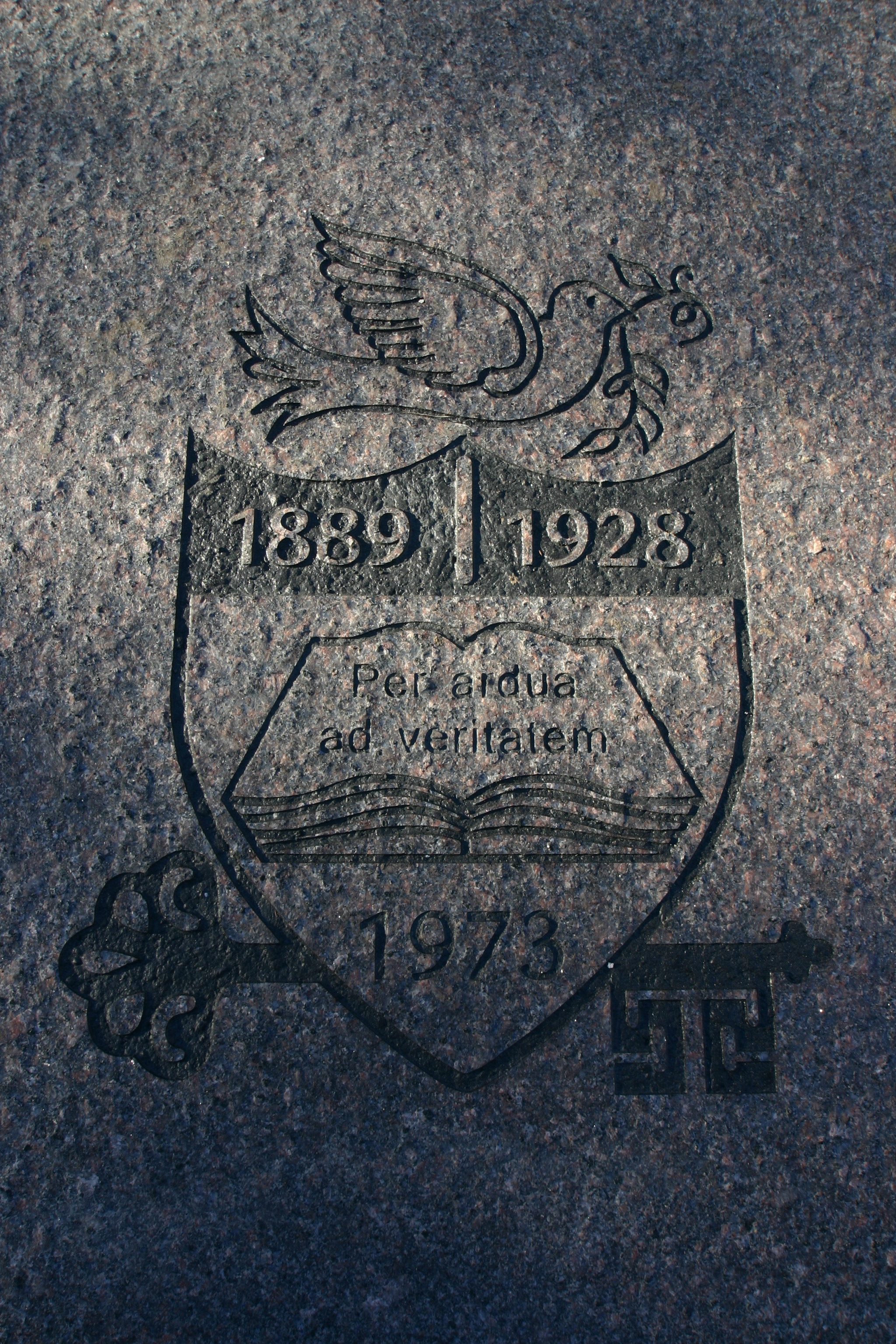 Dwight Englewood School Crest was engraved in the granite.