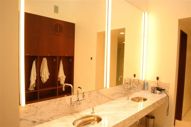 Well appointed "his and her" changing rooms, showers and steam room.