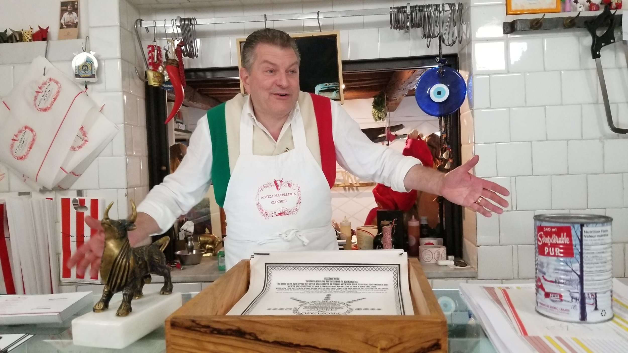 Dario Cecchini at home behind the butcher case