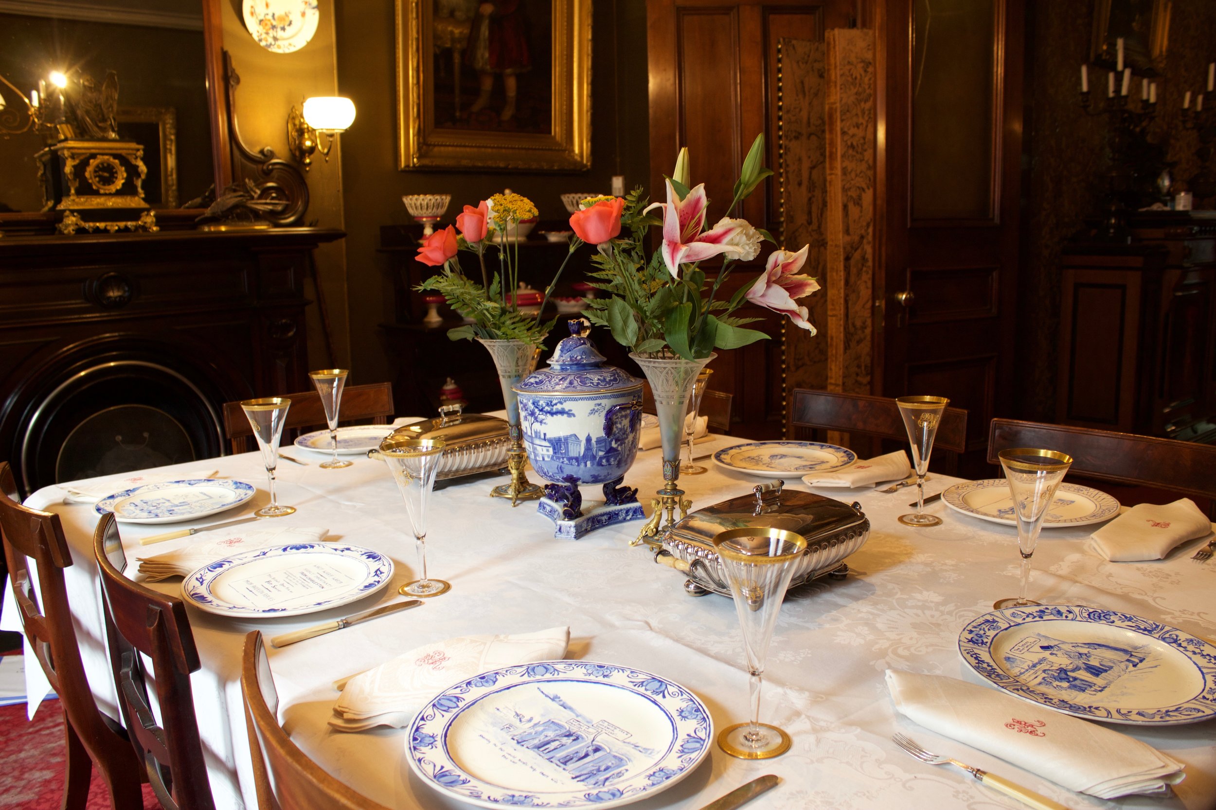 Installation documentation of a series of eight handmade ceramic plates at the Gibson House Museum (circa 1860, Boston, MA) rendered in oil and spray paint, 2017, dimensions variable.