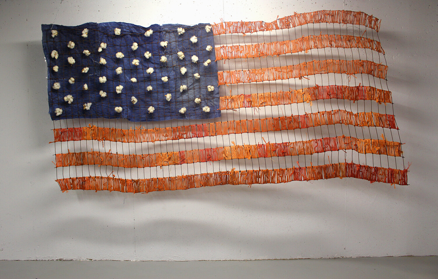  “Blue Collar Dream, 2020, Hay bailing string, cotton, denim, indigo dye and wire, ” 53” x 102” 