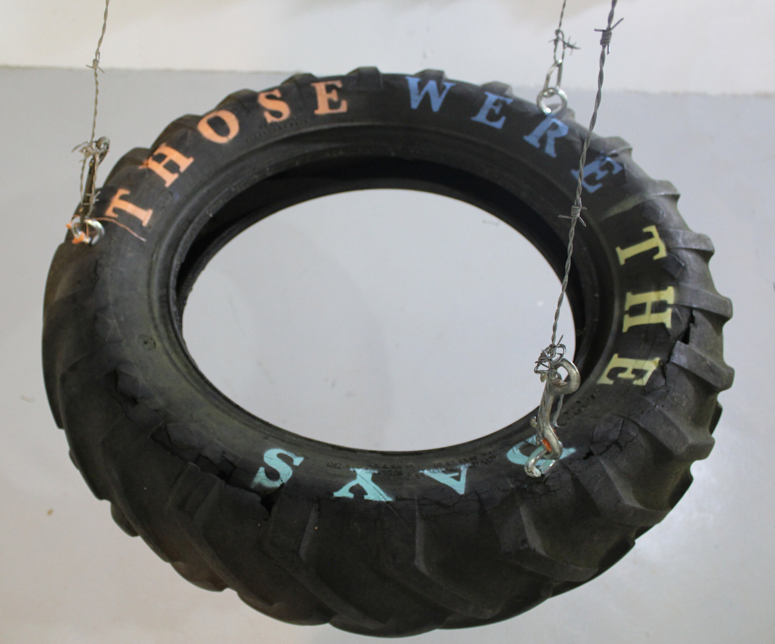  "Nostalgia," 2020, Spray paint, found barbed wire and double-end snaps on found rubber tire, 67" x 34" x 34” 