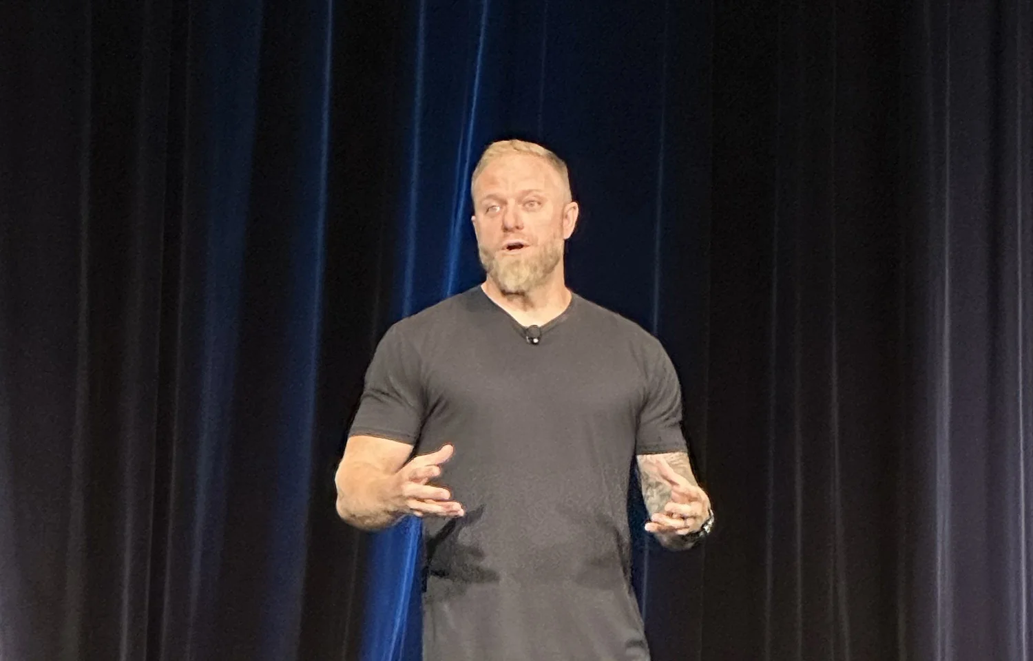 Danny Lehr speaking on stage
