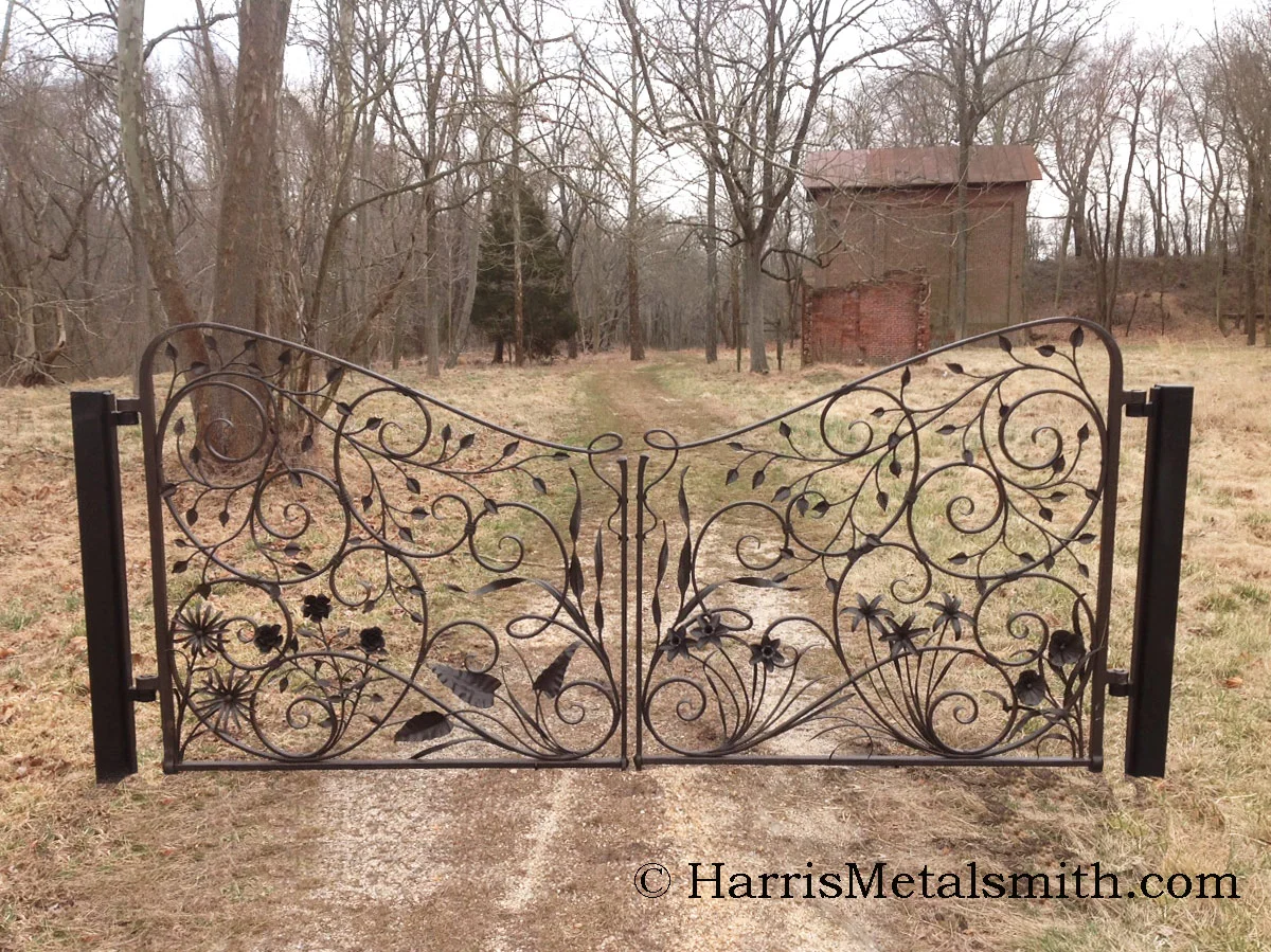 These gates were designed to be hung between 2 stone pillars, they are displayed here on a temporary stand.