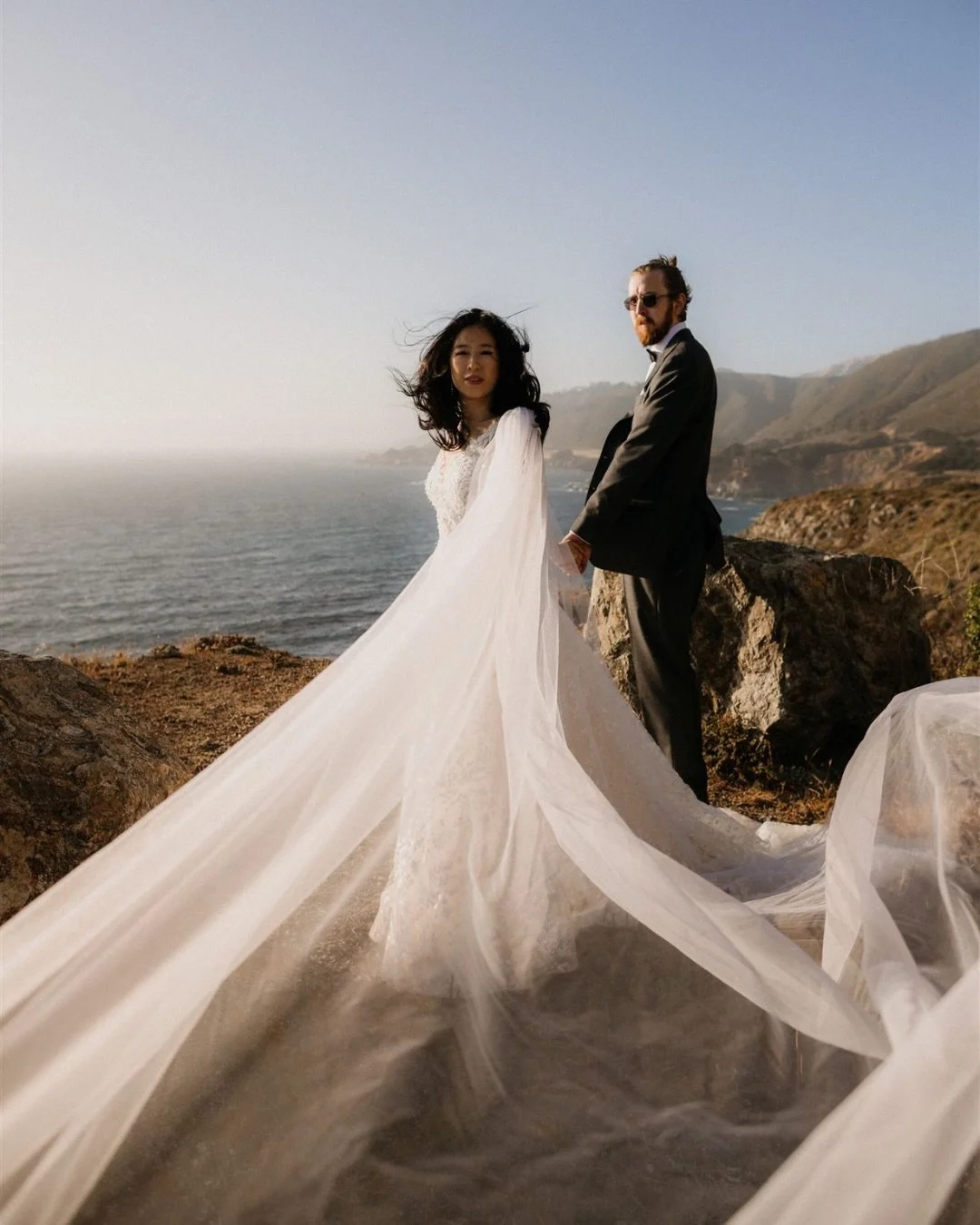 Embracing the beauty of that wild coastal breeze 🌬️
&bull;
Some of the best photos happen in the in-between moments, especially when it starts with a quick, &ldquo;let&rsquo;s stop here&rdquo; idea.

Big Sur is full of spots like that. Little pull-o