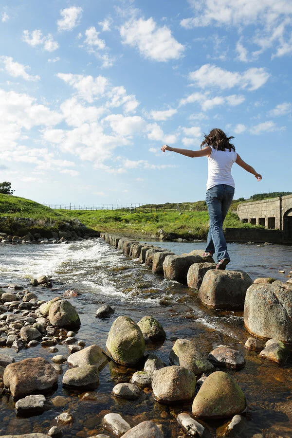 bigstock-Young-girl-runs-across-steppin-16554824.jpg
