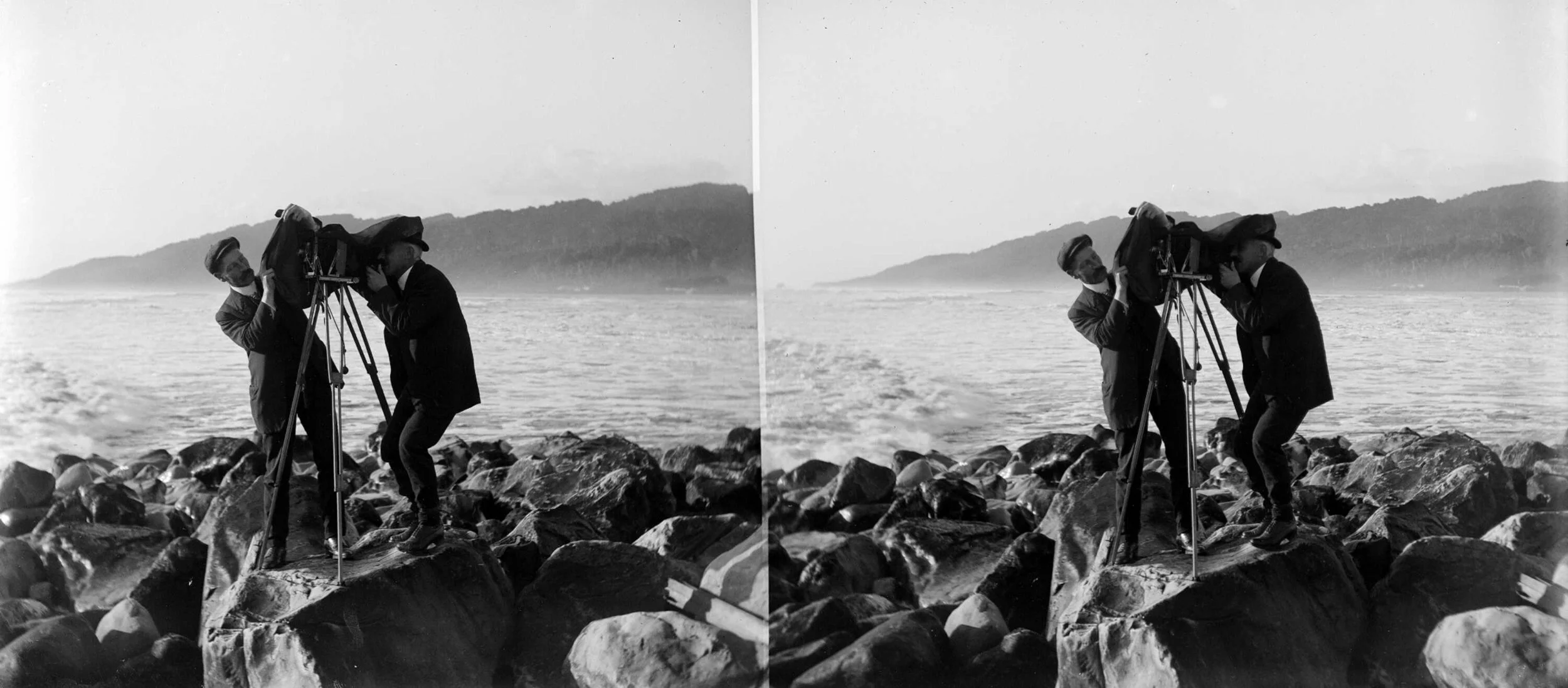 Photographer and assistant, with a camera