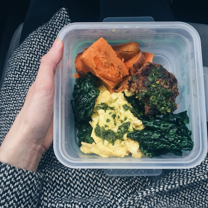 The prepped lunch that saved the day (and my Whole30): homemade apple sage pork sausage, pastured eggs with chimichurri, kale cooked in ghee, roasted sweet potatoes.