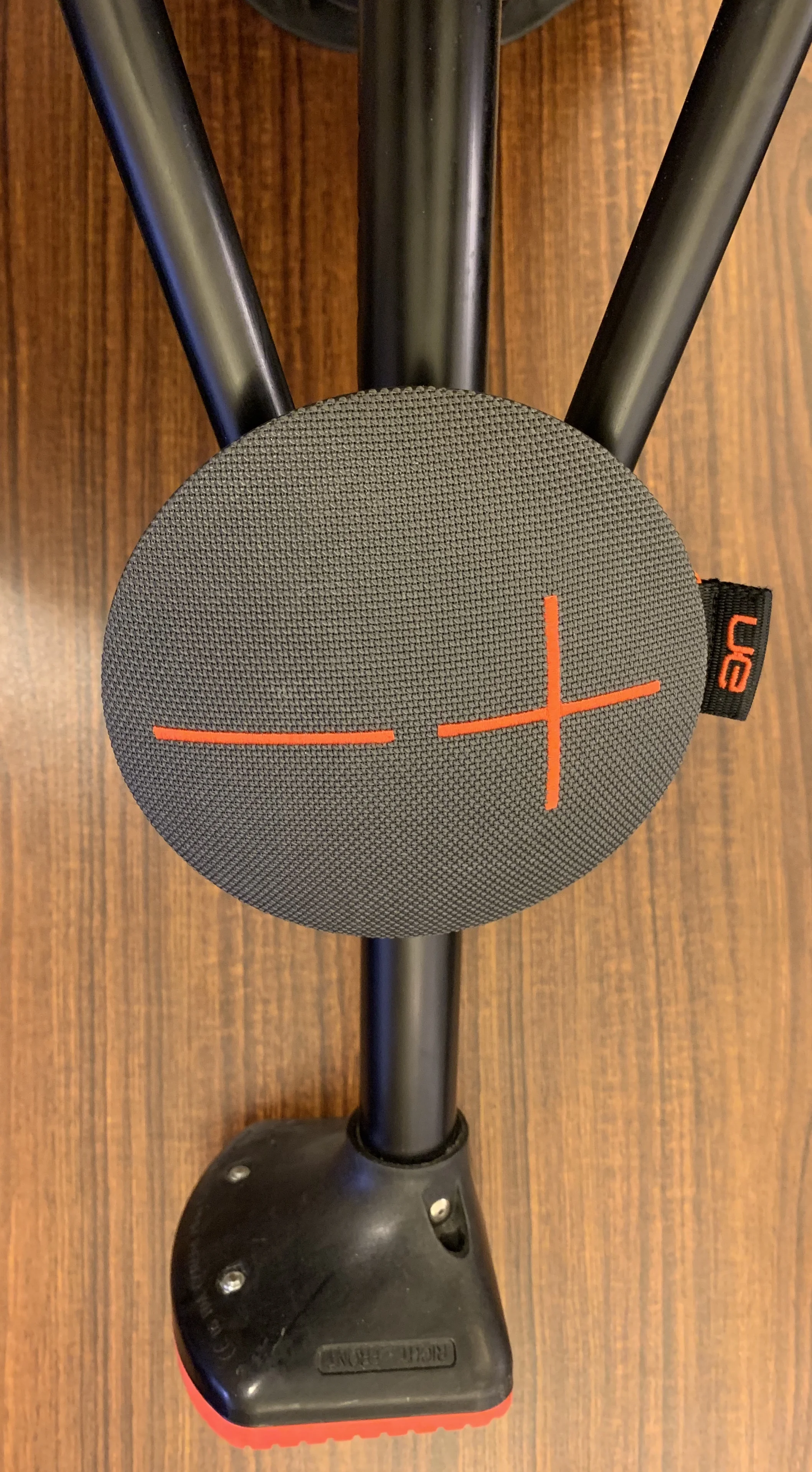 The UE Roll 2 Bluetooth speaker has a bungee cord on its back. This allows it to be strapped to the crutches or the iWalk’s leg. My podcasts and music go with me and it stays out of the way.