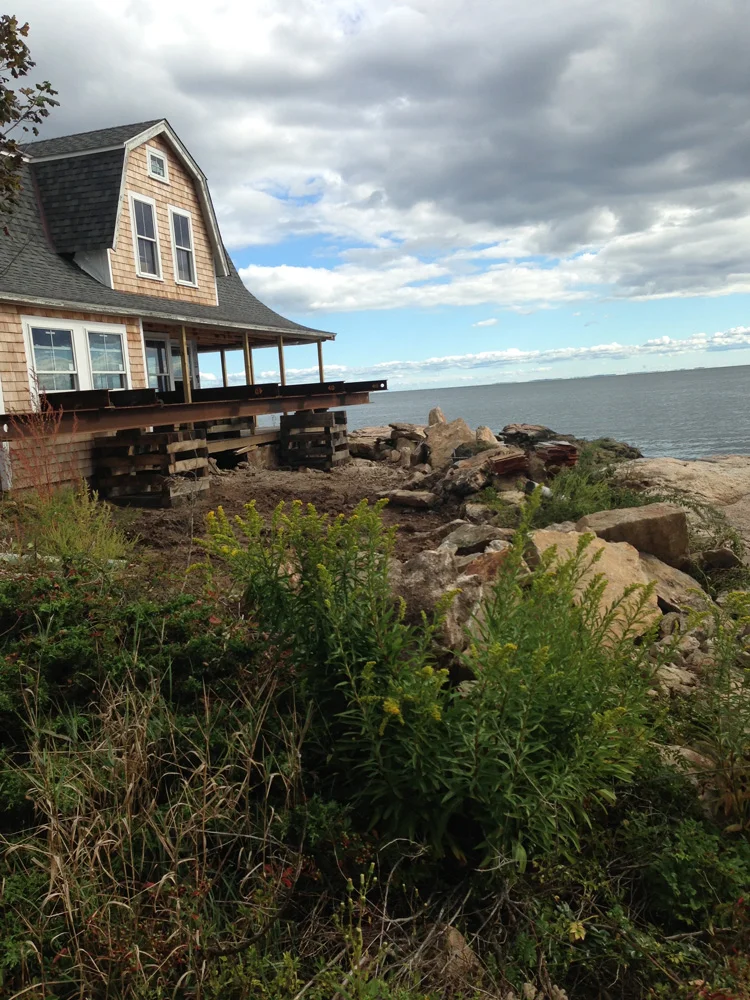 Side yard—which will have a patio