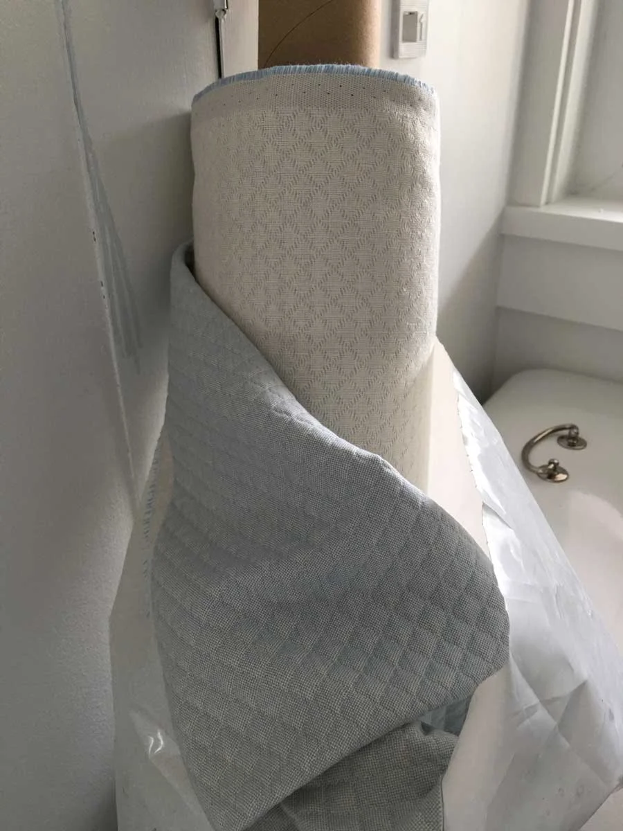 Leftover fabric from our old apartment on 52nd street. We're using the remnant role (which has been in storage for 12 years!) for the window seat in the living room. 
