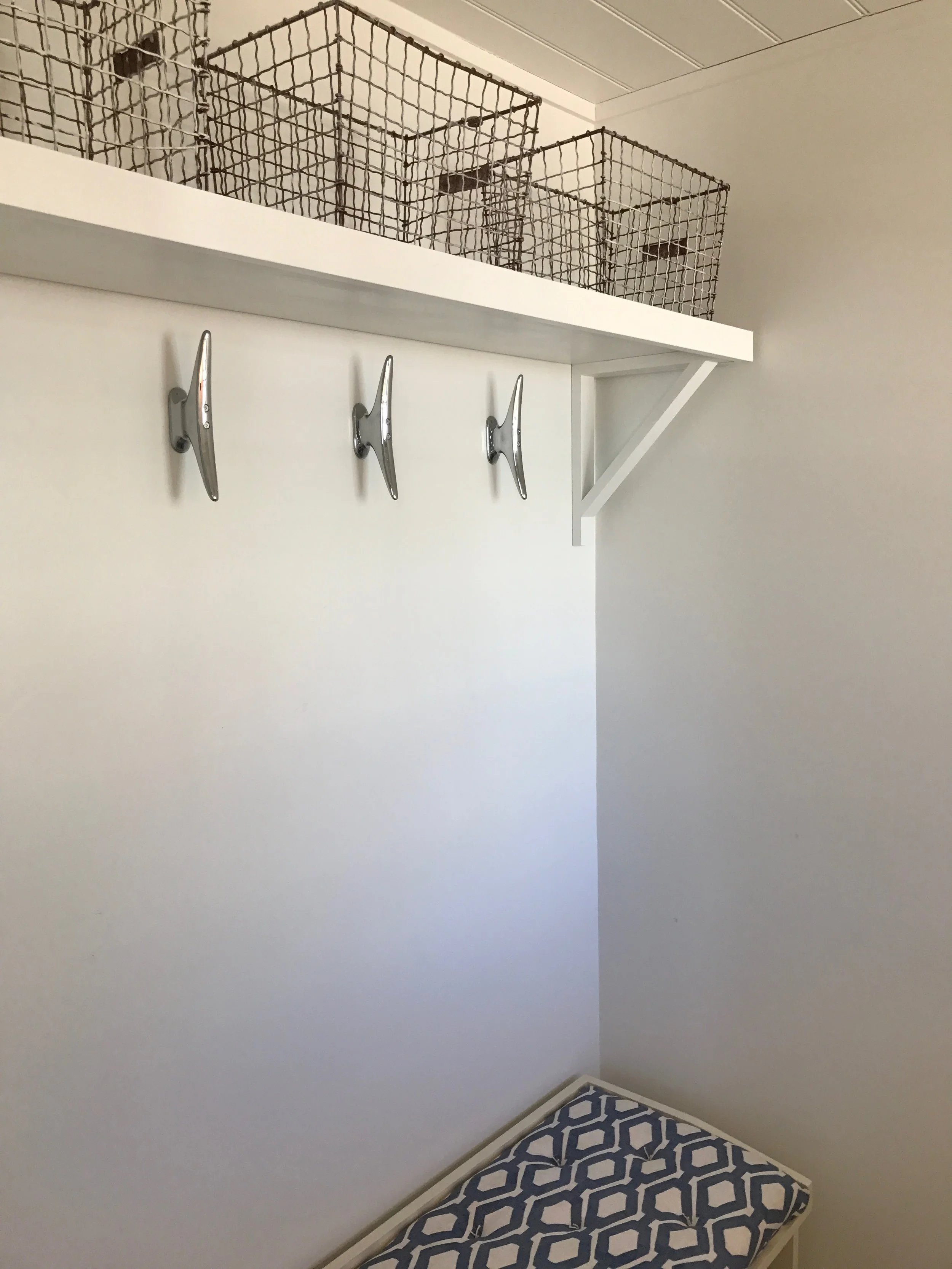 Ship cleats from Frontgate, a great find. Paired with my vintage wire baskets original.