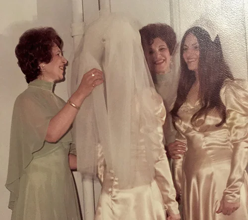 Hilda adjusting the veil she made for Sharon's June 15, 1975 wedding in West Orange, New Jersey - Sharon wore her mother's wedding gown