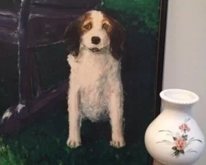This portrait of Major and the lamp help to document life on the farm where Anna raised her family