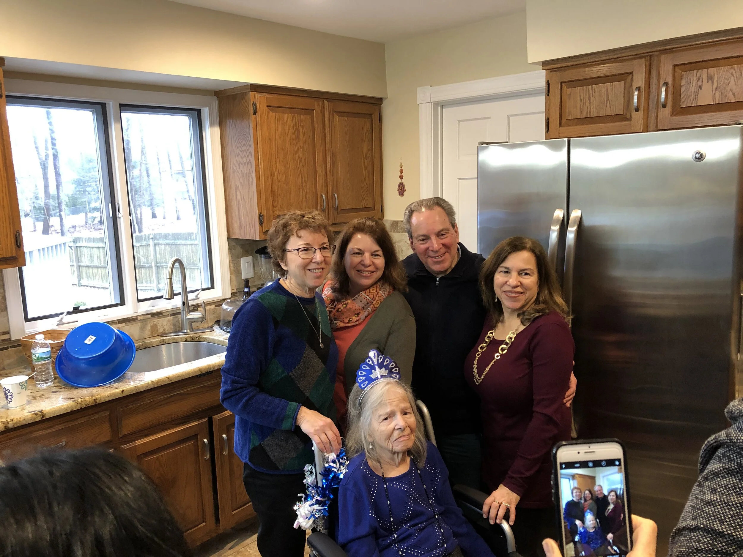 Karen, Sheryl, Andrew, and Tobie (missing Barbara from Colorado who takes turns visiting their mom, with Karen from California) and their mom, Erica Marcus 95th birthday celebration February 24, 2019